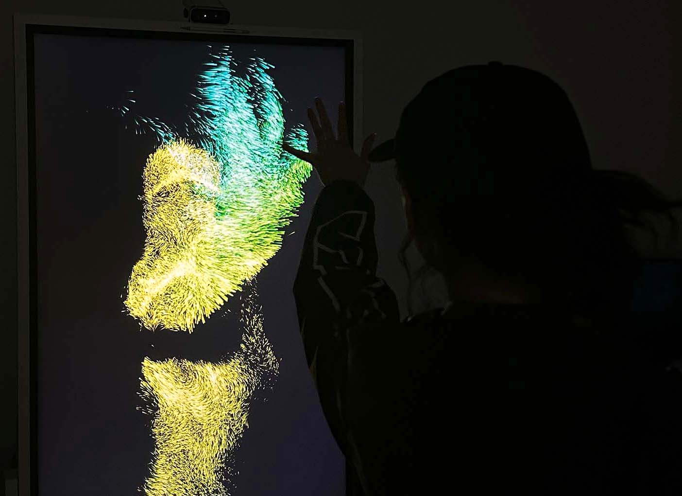 Visitor in front of Spectrum Mirror at the final showcase